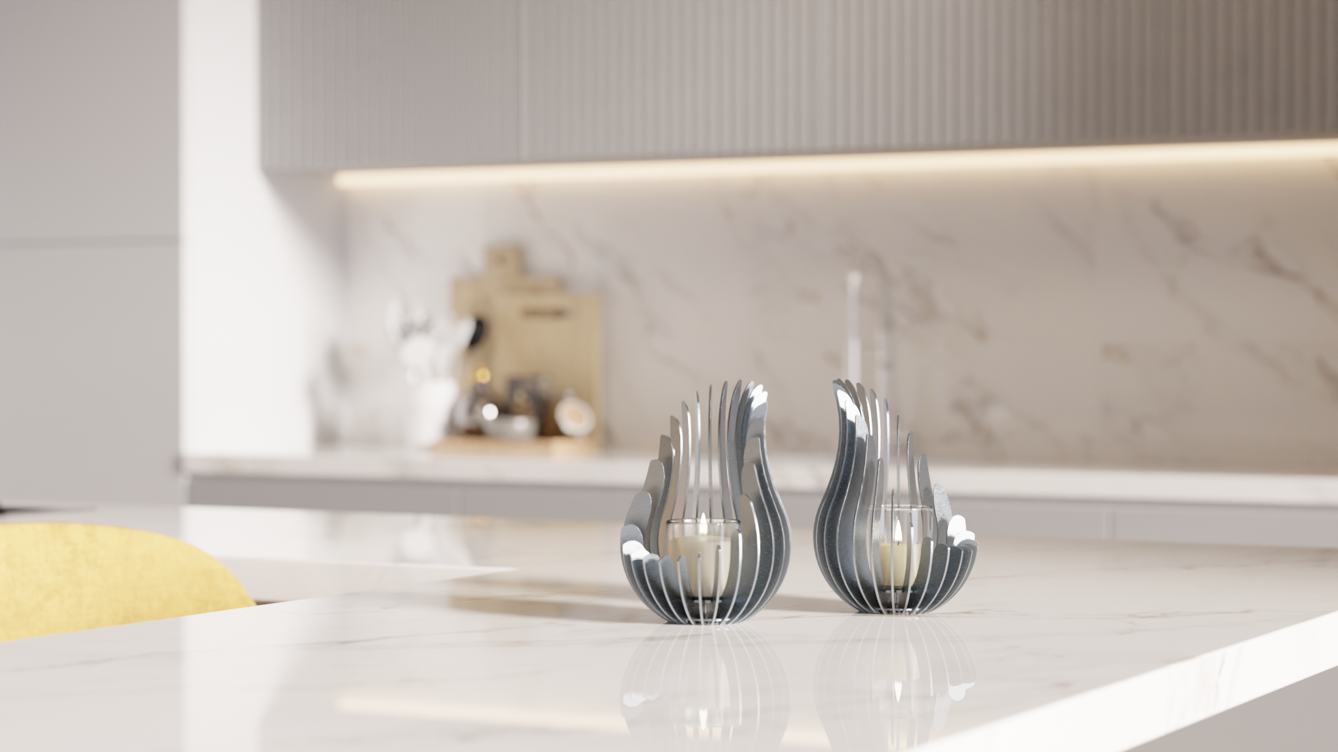 Pair of Kelray stainless steel candle holders styled on a marble kitchen countertop in a modern interior.
