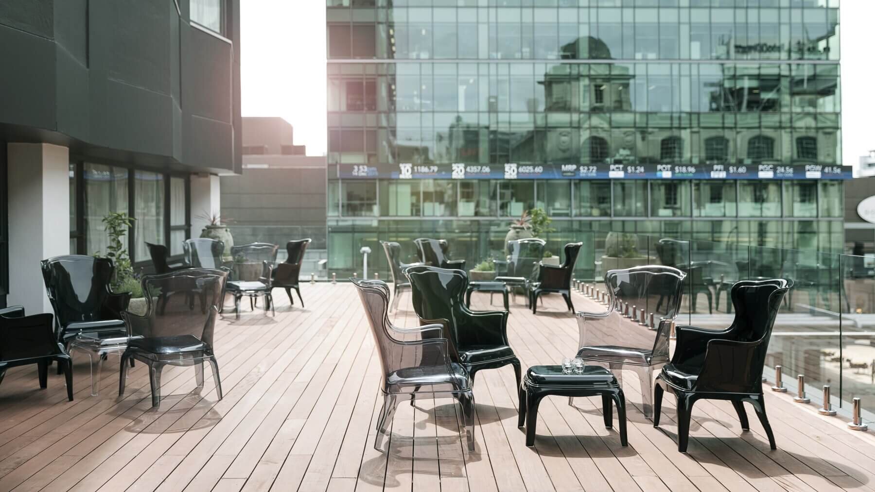 Elegant rooftop terrace at Grand Mercure with designer seating and discreetly integrated Kelray infrared heaters — delivering premium comfort in modern hotel settings